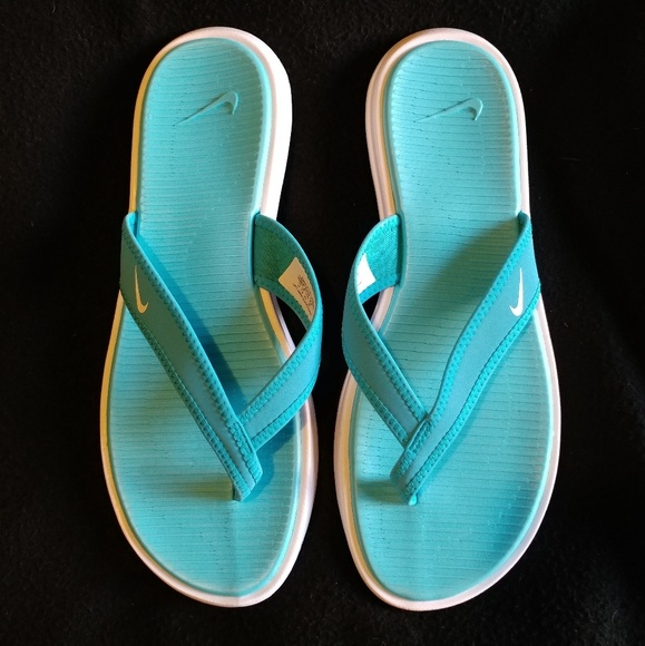 nike white flip flops womens